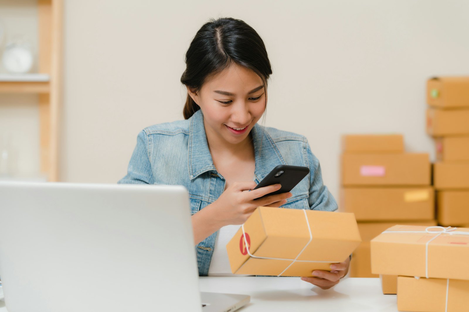 Online seller preparing a parcel